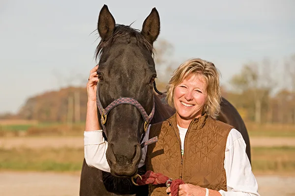Happy woman with horse web Happy woman with horse web